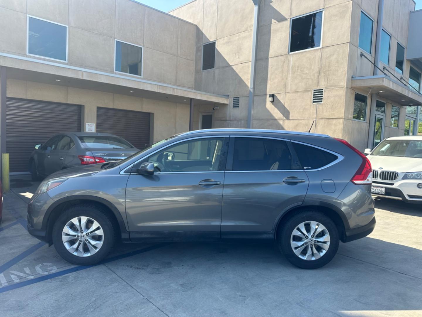 2012 BLUE /GRAY Honda CR-V leather (JHLRM3H70CC) with an 4 CYLINDER engine, Automatic transmission, located at 30 S. Berkeley Avenue, Pasadena, CA, 91107, (626) 248-7567, 34.145447, -118.109398 - Cars and Trucks!! Leather! Moon-roof! Well equipped! In the bustling streets of Pasadena, CA, and the vibrant neighborhoods of Altadena, Glendale, and the broader LA County, finding a reliable, stylish, and affordable vehicle can be a daunting task, especially if you're navigating the complexities - Photo#2